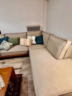 Corner sofa used with washable and water resistant fabric