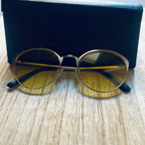 Hawkers sunglasses used, transparent with yellow tint
