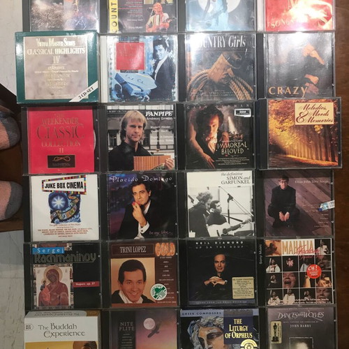 CDs of foreign music like new, 163 singles, doubles & triples