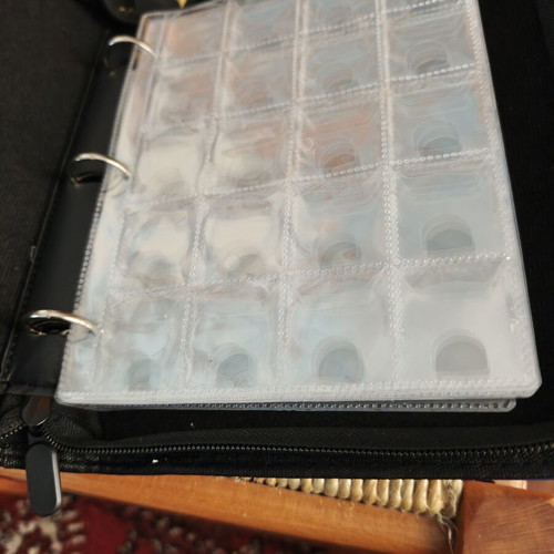 Coin album with 200 slots, zipper closure, strap