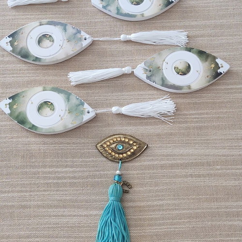 Ceramic gouria and metal eye charm set like new with blue beads and tassels