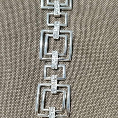 Statement bracelet like new, silver with geometric design and rhinestones