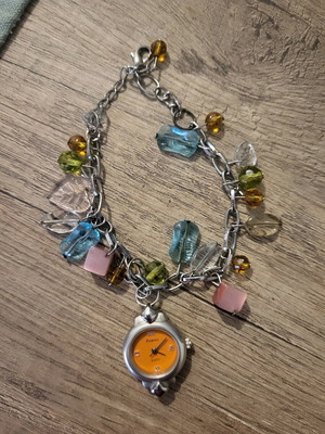 Women's watch-bracelet with charms like new, multicolor