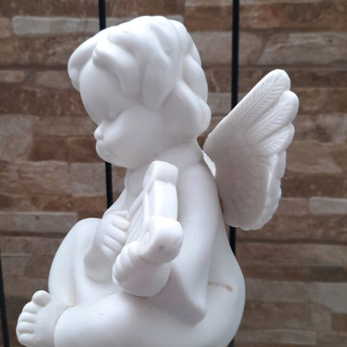 White angel figure ceramic used