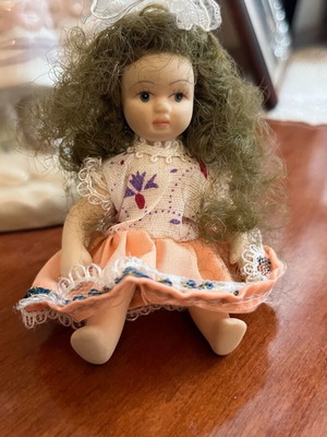Vintage porcelain miniature doll used