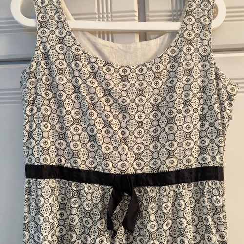 Cotton dress with ruffles, black trims, zipper waist