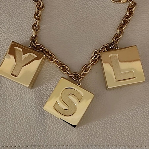YSL bracelet from makeup collection like new, gold color
