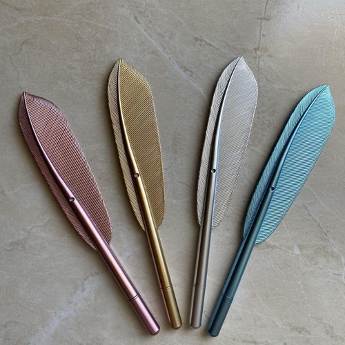 Feather-shaped pens new, set of 4