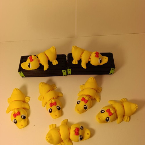 Flexi Duck Keychains 3D printed with movable body
