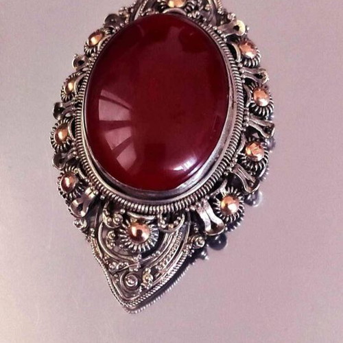 Handmade vintage silver brooch with carnelian stone used