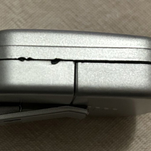 Pocket Radio with Headphones like new, silver color