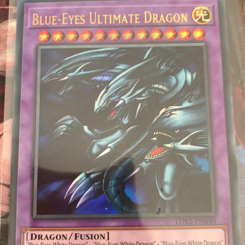 Blue-Eyes Ultimate Dragon Yu-Gi-Oh card new, ultra rare Kaiba