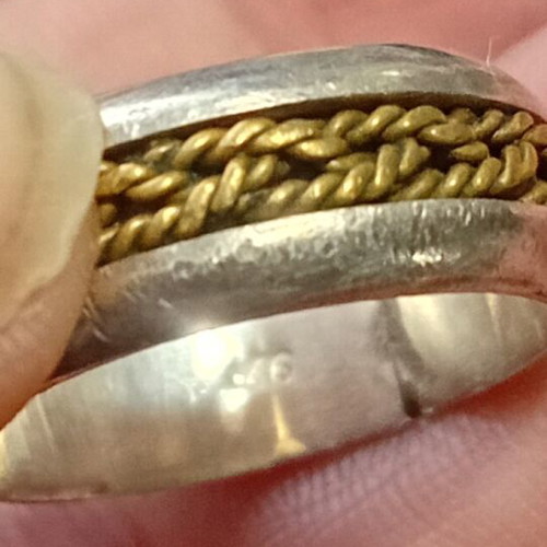 Silver ring 9.25 like new, wedding band style with gold-plated braid large size