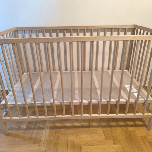 IKEA baby cot with mattress and bedding