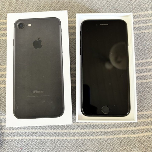iPhone 7 with 5 cases and 3 screen protectors