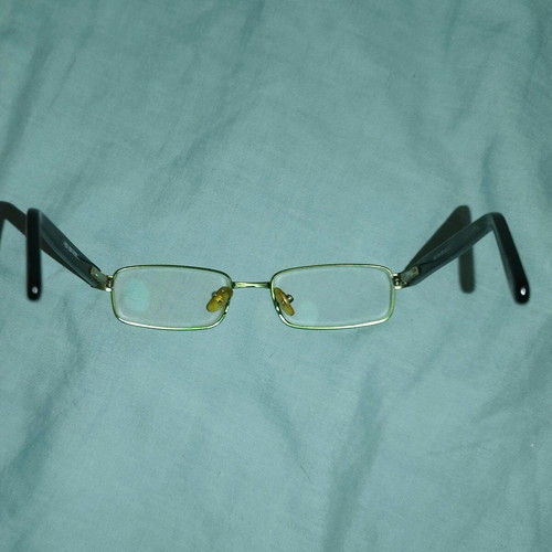 Children's prescription glasses used, black and green