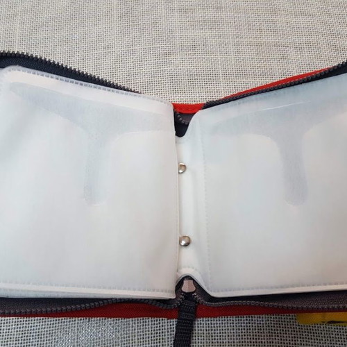 CD/DVD cases used, pack of 2, 20 slots each with zipper yellow and red