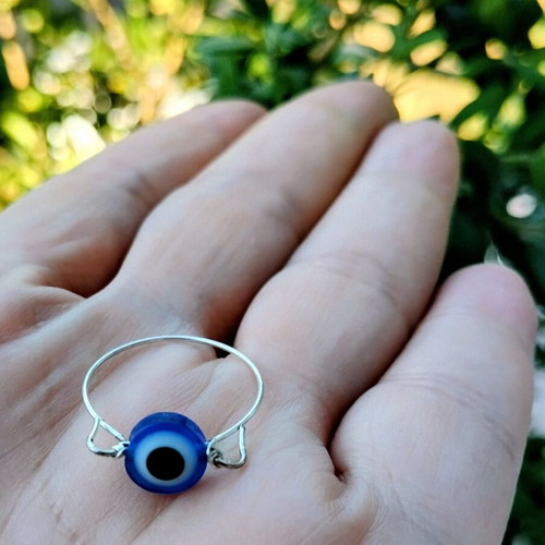 Handmade steel ring with blue evil eye
