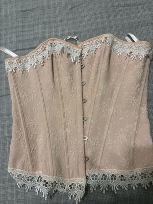 Pink corset like new with clips, size M/L, beige