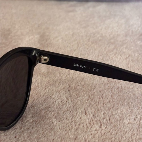 DKNY sunglasses like new with black lenses