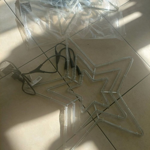 Illuminated star new, plastic with white metal frame