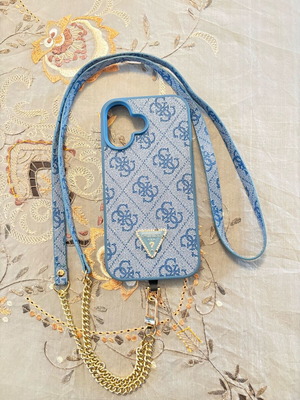 Guess case for iPhone 16 used with blue strap