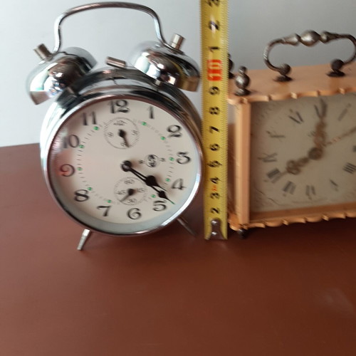 Set of two vintage wind-up clocks used, circa 1950