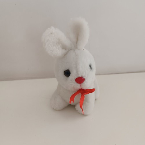 Lacta white plush bunny with red bow