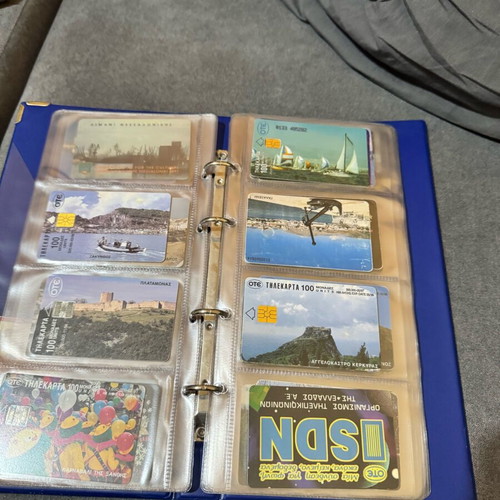 Album with 50 various phone cards like new