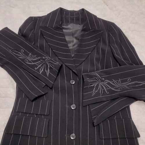 Women's black two-piece suit like new with white pinstripe size M