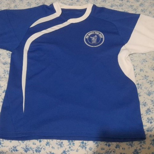 Niki Volou children's football jersey circa 2009