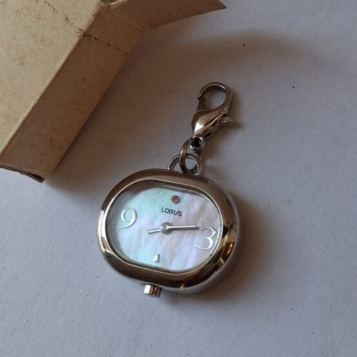Lorus Quartz watch used, beige and silver, good condition