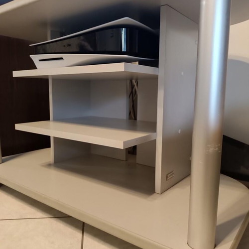 TV stand like new with wheels and 3 shelves