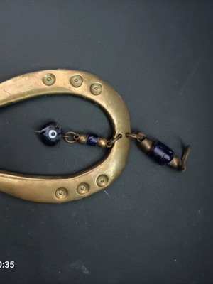Lucky horseshoe made of solid brass with beads like new