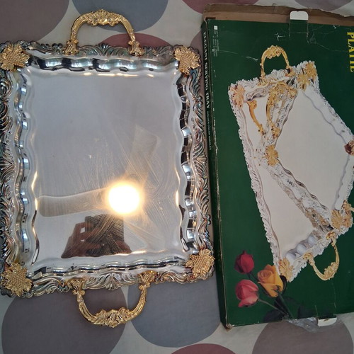Elegant serving tray with golden handles