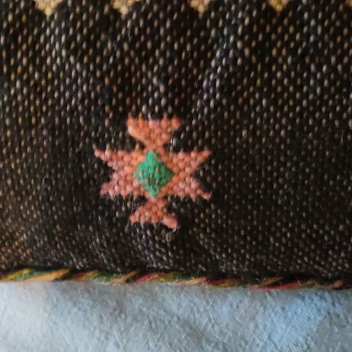 Handwoven pillow used, handmade