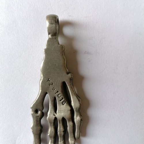 Metal skeleton foot pendant Young Zone new with tribal designs