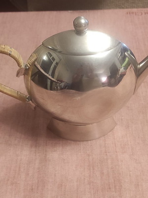 Vintage teapot by designer Nick Munro used with dents