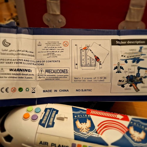 Airplane toy used with lights and sounds, transforms into station