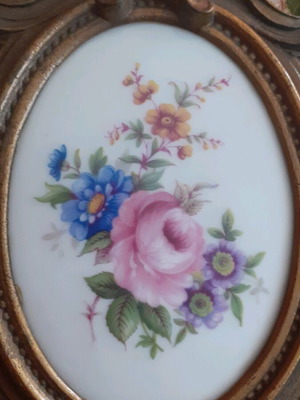 Porcelain miniatures like new with bronze border