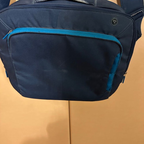 Laptop bag like new, blue with multiple compartments