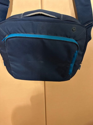 Laptop bag like new, blue with multiple compartments
