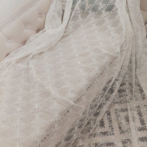 Two sewn white lace curtains, 2.5m height, 1.5m width each