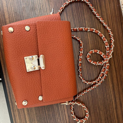 Vintage bag like new, orange with gold chain strap