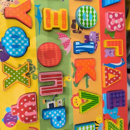 Wooden puzzle with letters like new