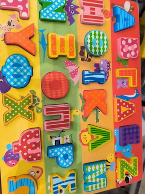 Wooden puzzle with letters like new
