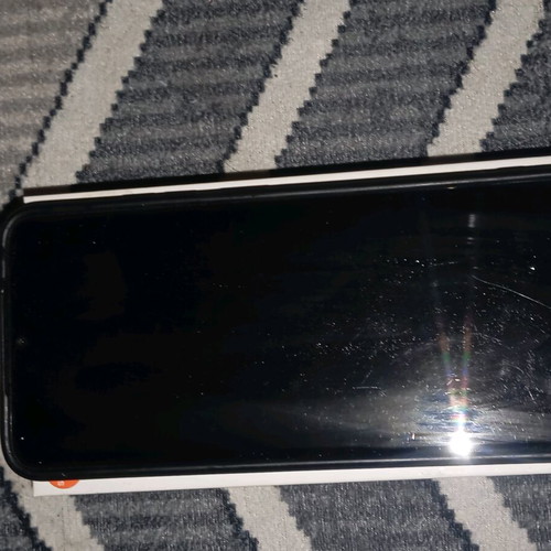 Redmi smartphone like new with box and protective case