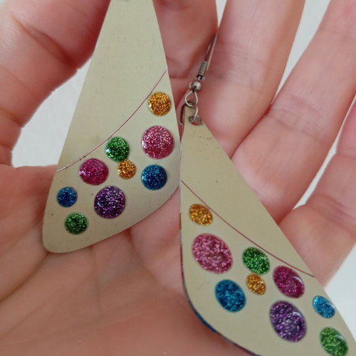 Earrings used, plastic with glitter