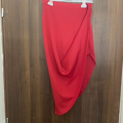 Red midi skirt with asymmetric design by TATU like new