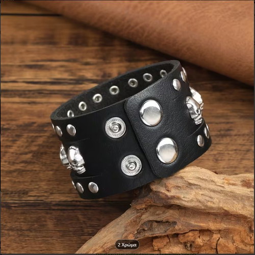 Leather bracelet new with studs and skulls black